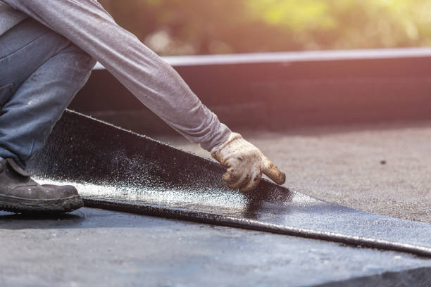 Professional Basement Waterproofing technician working in Olivet, MI
